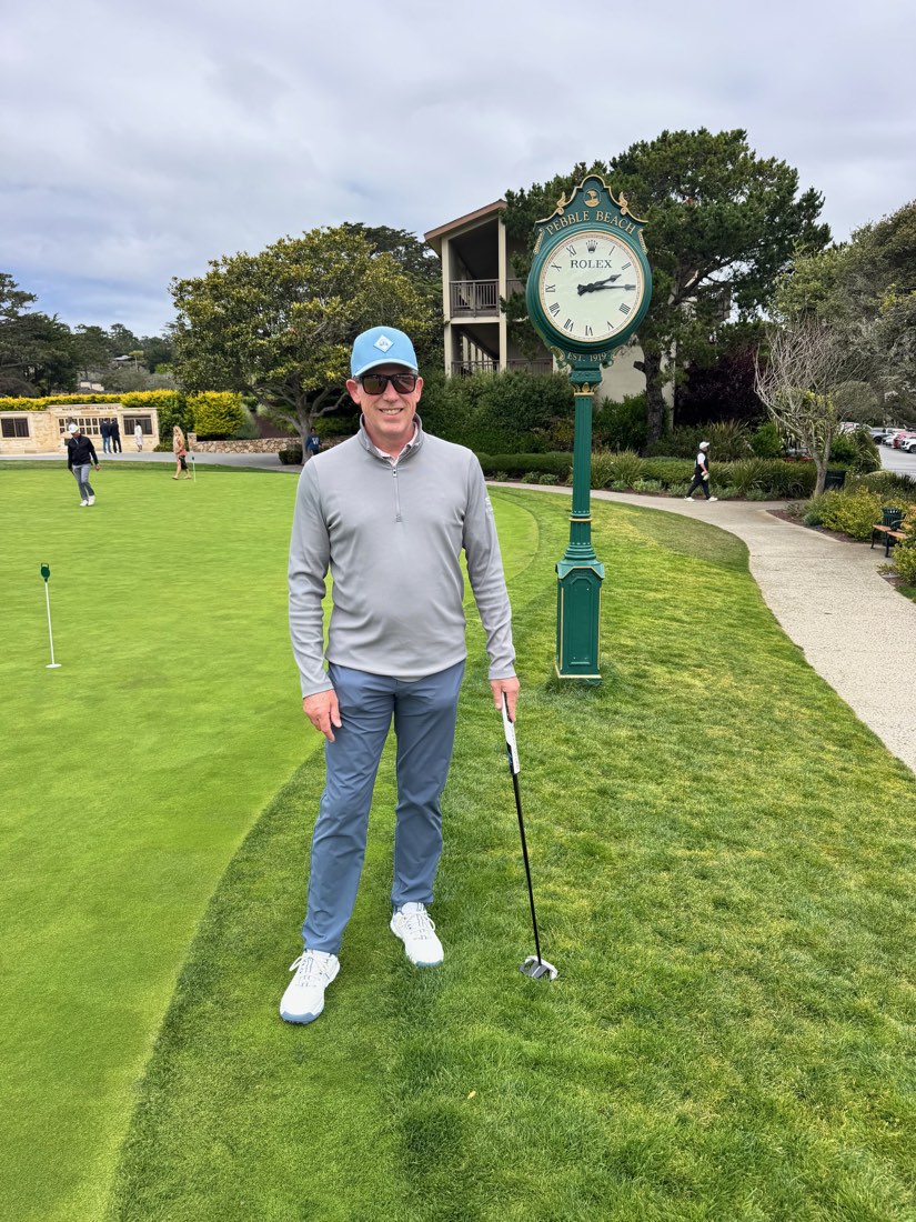 Dr. Barton on the putting green at Pebble Beach